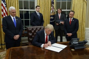 President Trump signs an executive order.