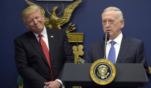 On  January 27, 2017, President Donald Trump, left, listens as Defense Secretary James Mattis, right, speaks at The Pentagon in Washington, D.C. (AP Photo/Susan Walsh)